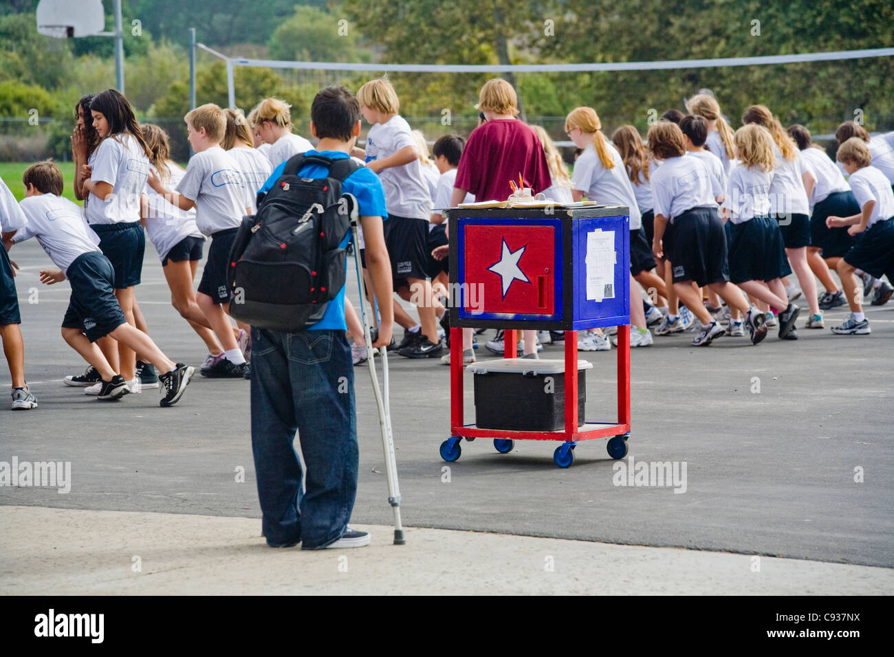 On crutches and unable to participate, a handicapped California middle