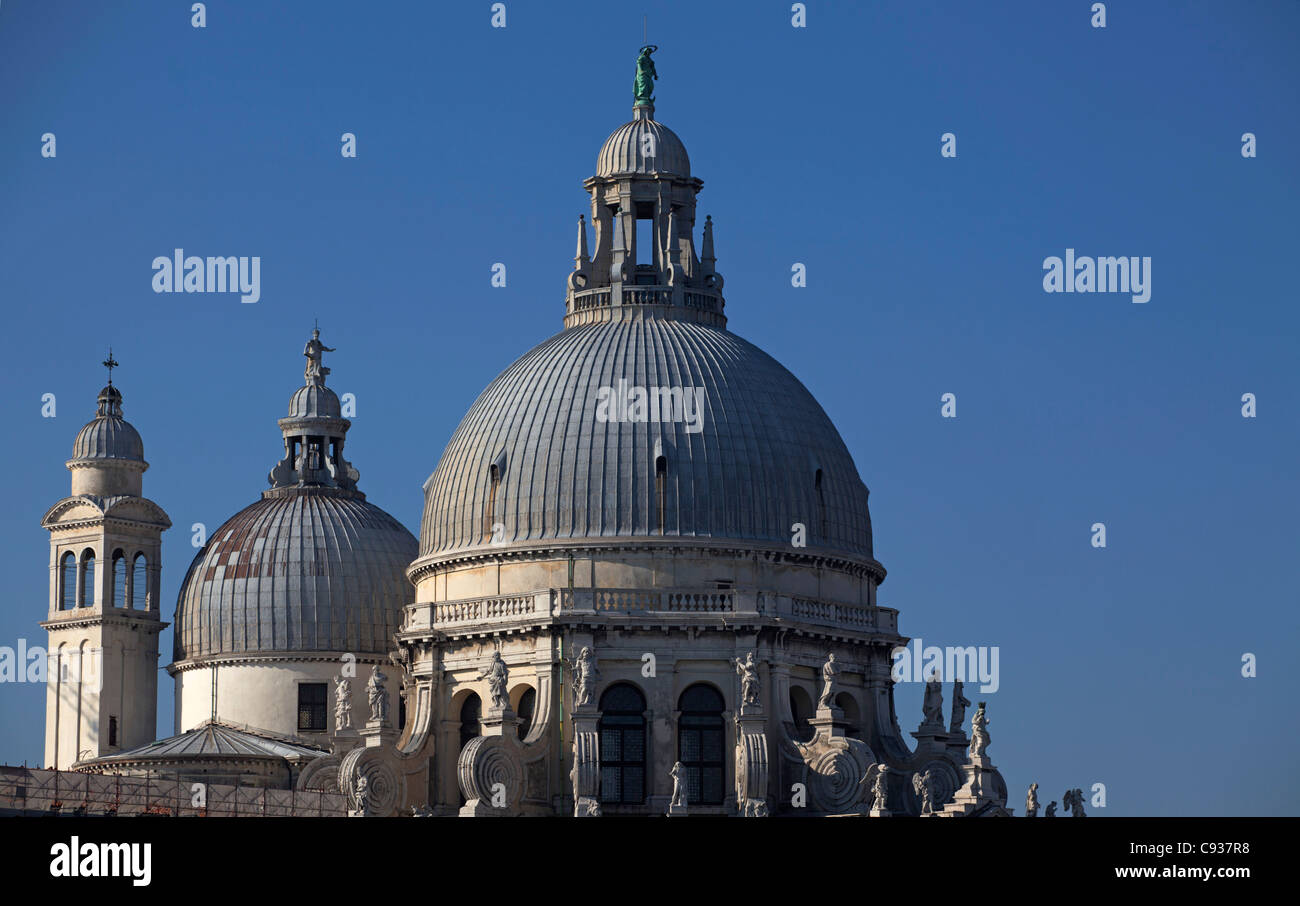 Venice, Veneto, Italy; Cupolas and bell tower of the church of Santa Maria della Salute, restored recently Stock Photo