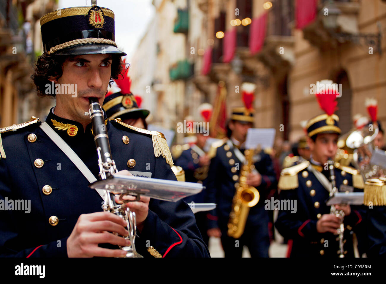 Sicily, Italy, Western Europe;  A clarinettist, of the band members, during the 'Misteri' procession of Trapani Stock Photo