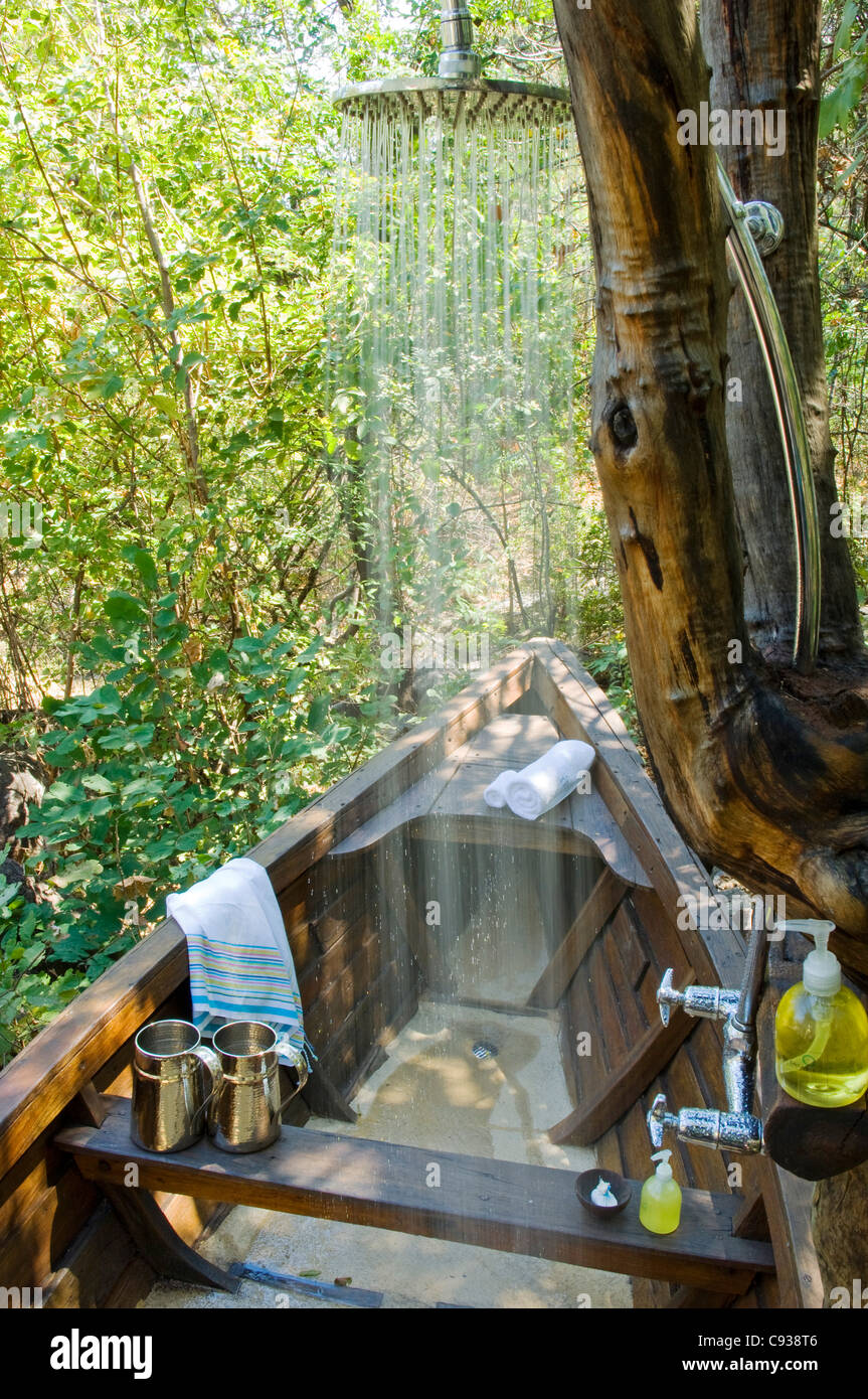 Malawi, Lake Malawi National Park. Stylish outdoor shower set in an old