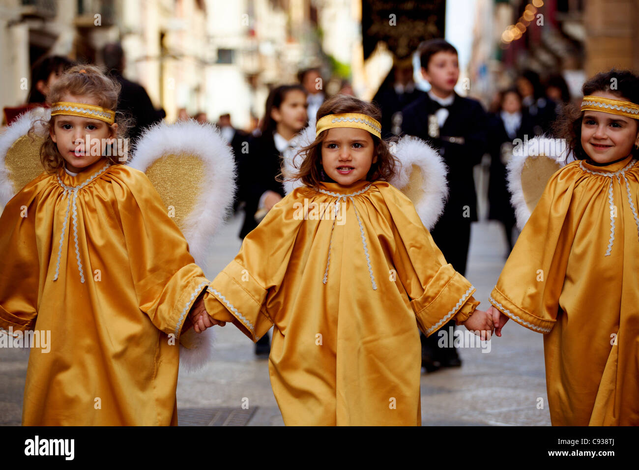 Sicily, Italy, Western Europe; Children dressed as angels during the 'Misteri' procession in Trapani Stock Photo