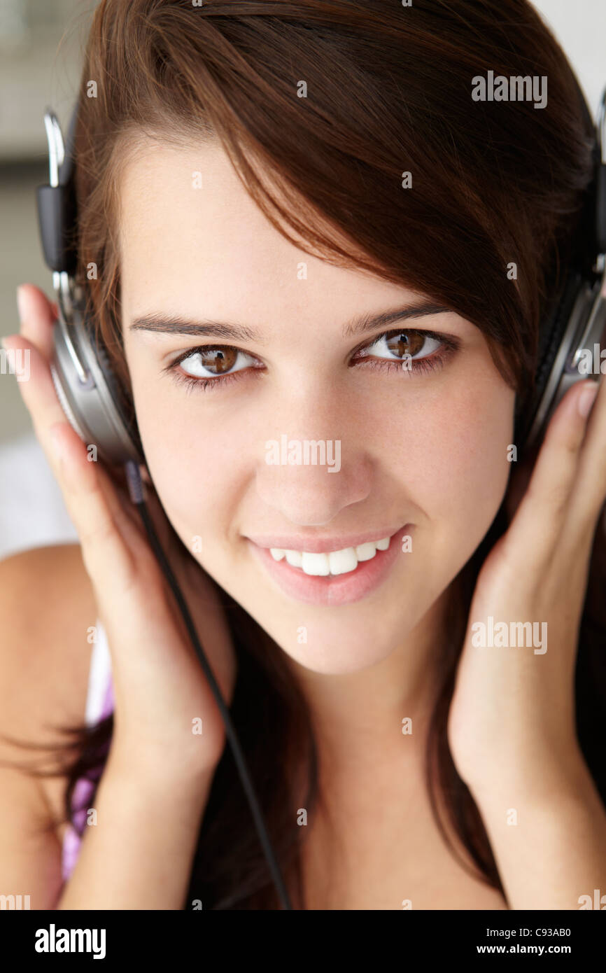 Teenage girl wearing headphones Stock Photo Alamy