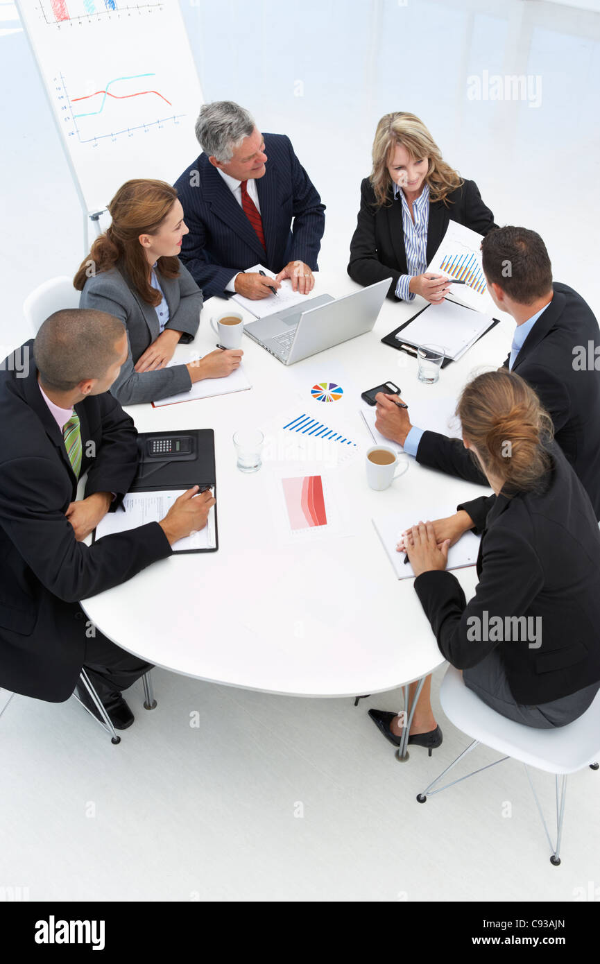 Mixed group in business meeting Stock Photo Alamy