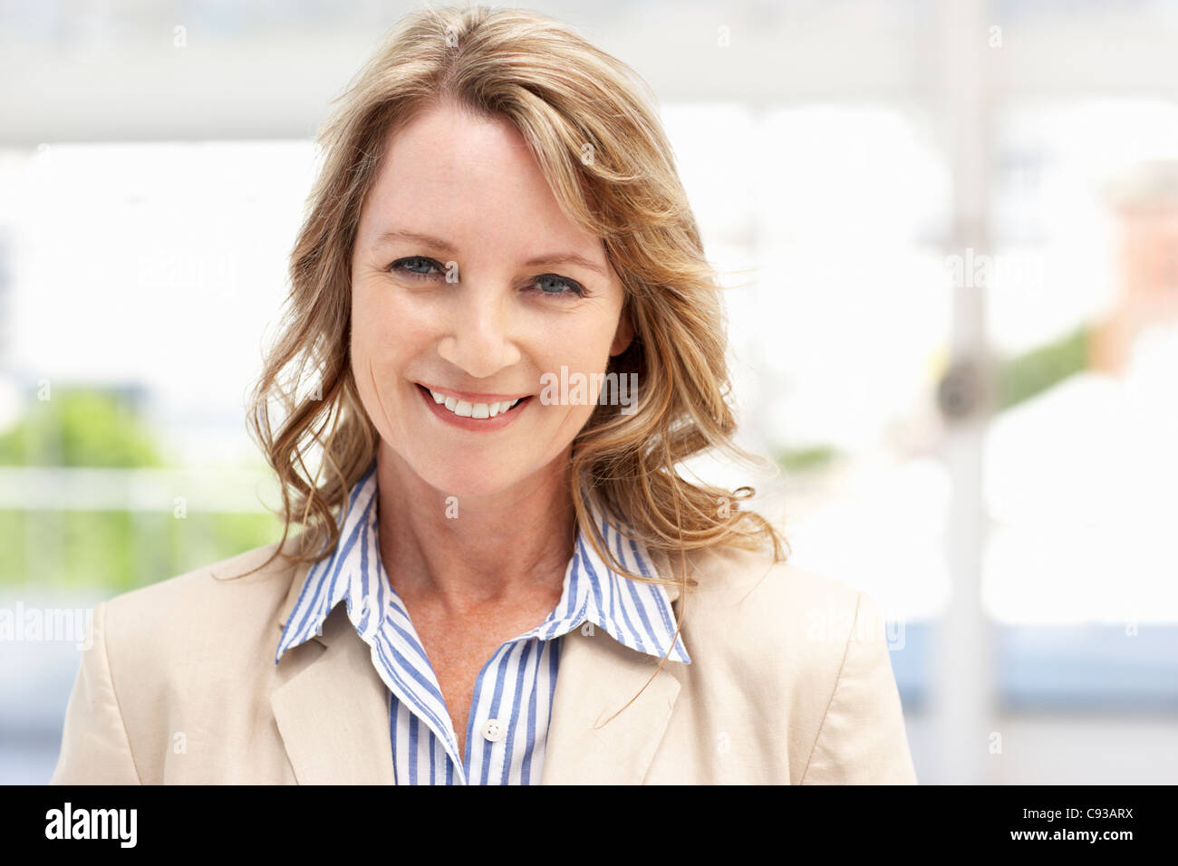 Mid age businesswoman Stock Photo