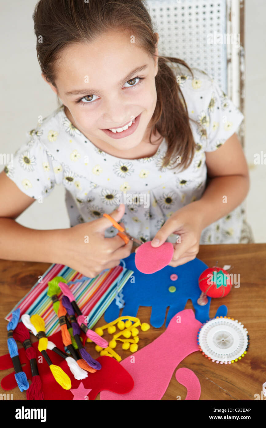 Young girl doing handicrafts Stock Photo