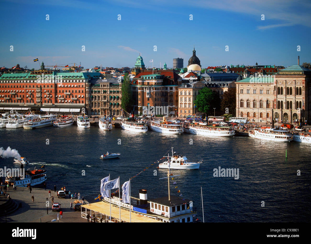 Passengers and steamships at Blasieholmen Island wharf on Archipelago