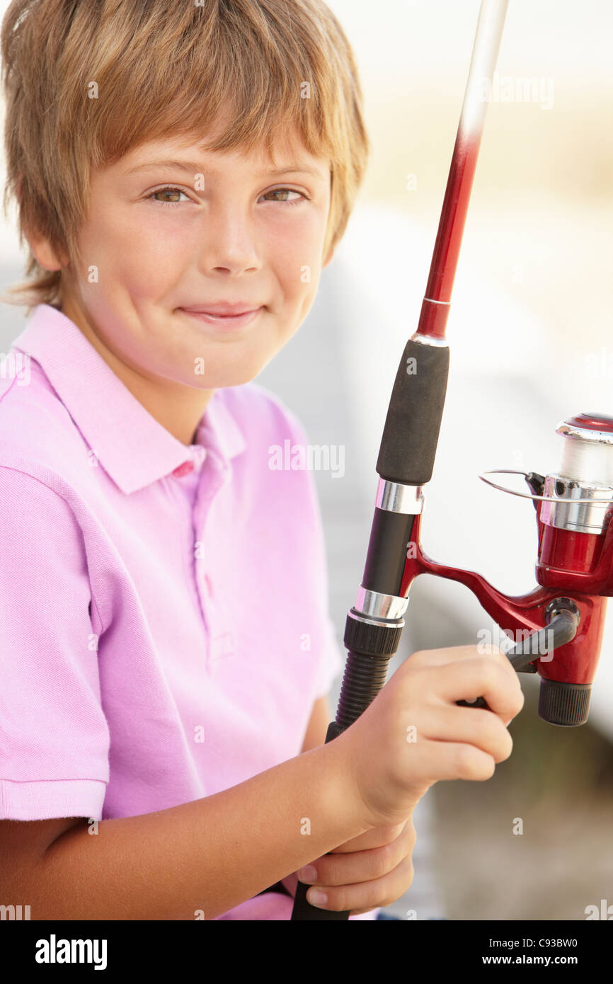Young boy with fishing rod Stock Photo