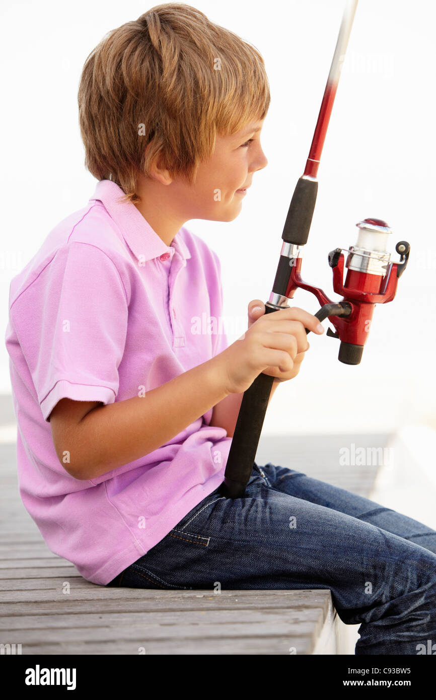 Young boy with fishing rod Stock Photo