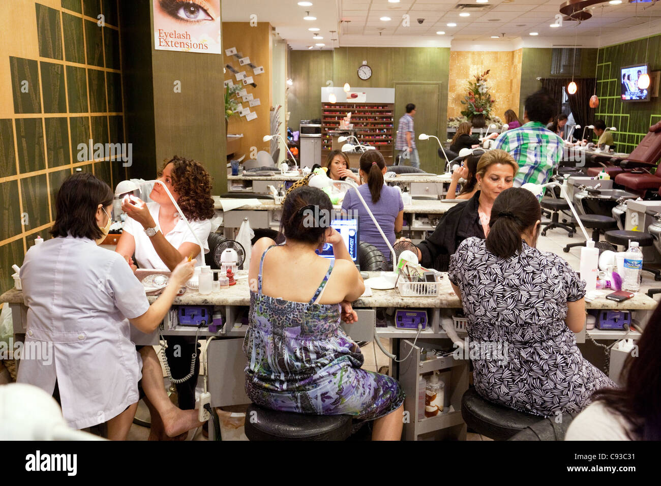 A scene in a  vietnamese nail bar, Montgomery Mall, Washington DC USA Stock Photo
