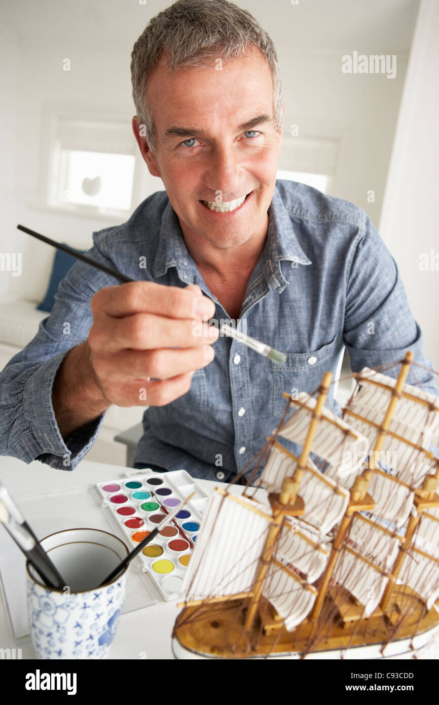 Mid age man model making Stock Photo