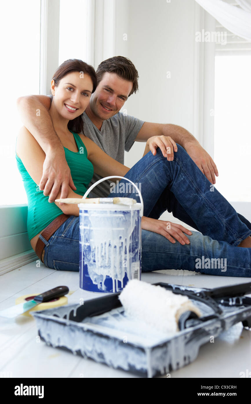 Couple decorating house Stock Photo Alamy