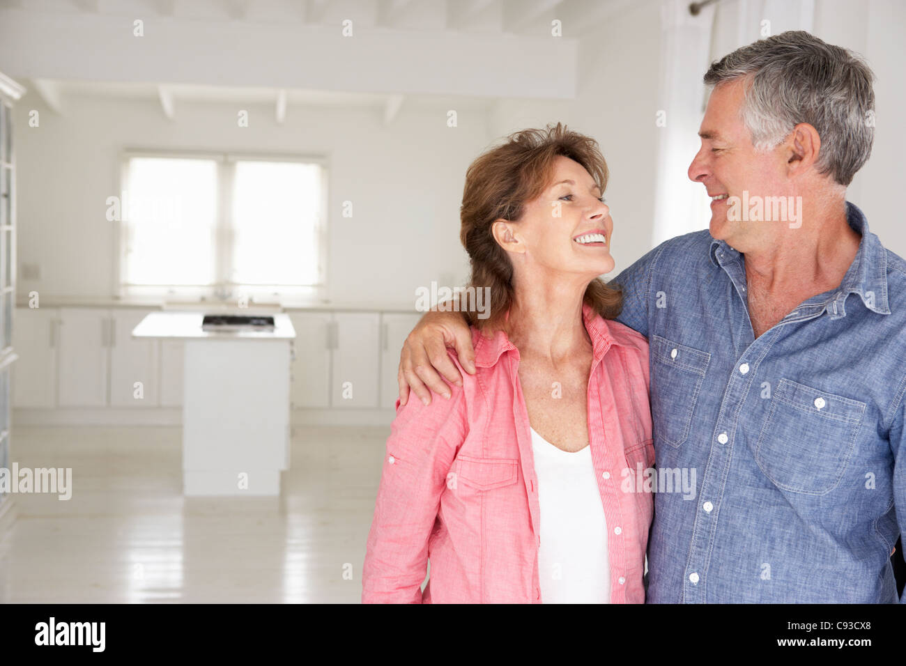 Senior couple in new home Stock Photo - Alamy