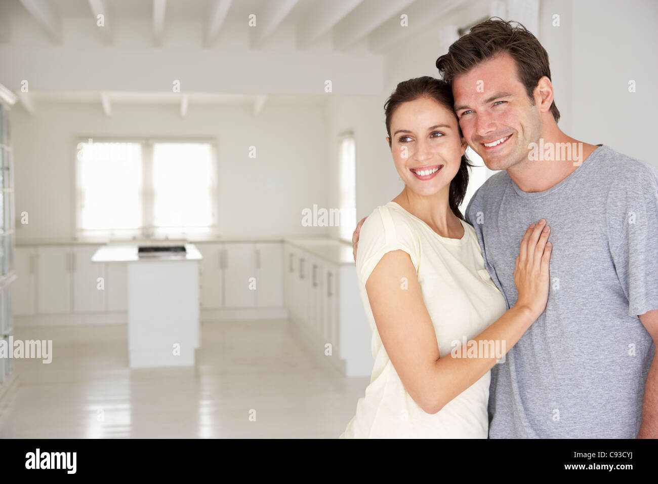 Couple in new home Stock Photo - Alamy