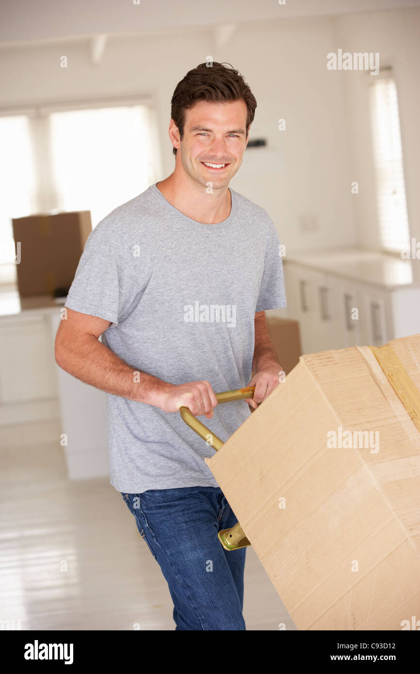 Man moving into new home Stock Photo Alamy