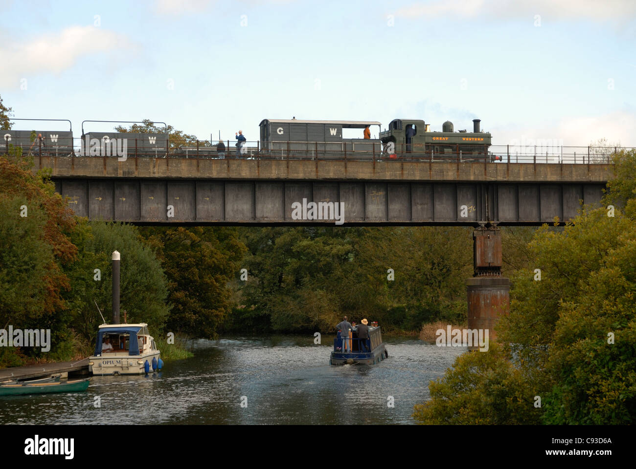 Restored Steam locomotive train  Ex GWR 14xx class Crossing the River Avon near Bitten via an original once disused Bridge. Stock Photo