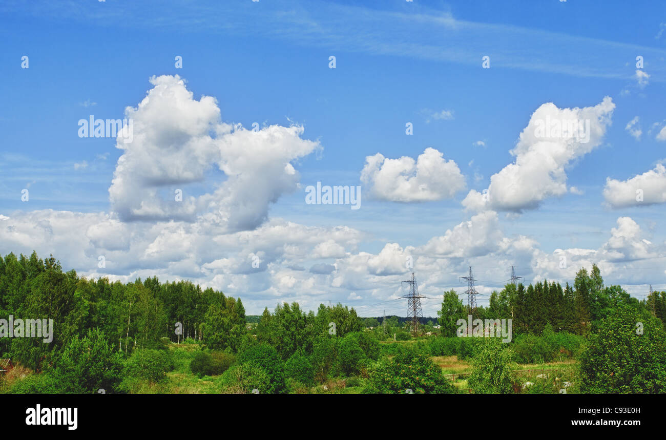 rural summer landscape with forest and blue sky Stock Photo - Alamy
