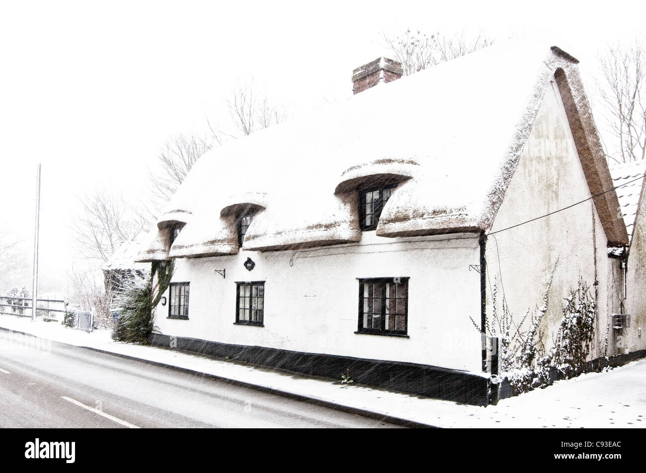 Snow covered Cottage Stock Photo - Alamy