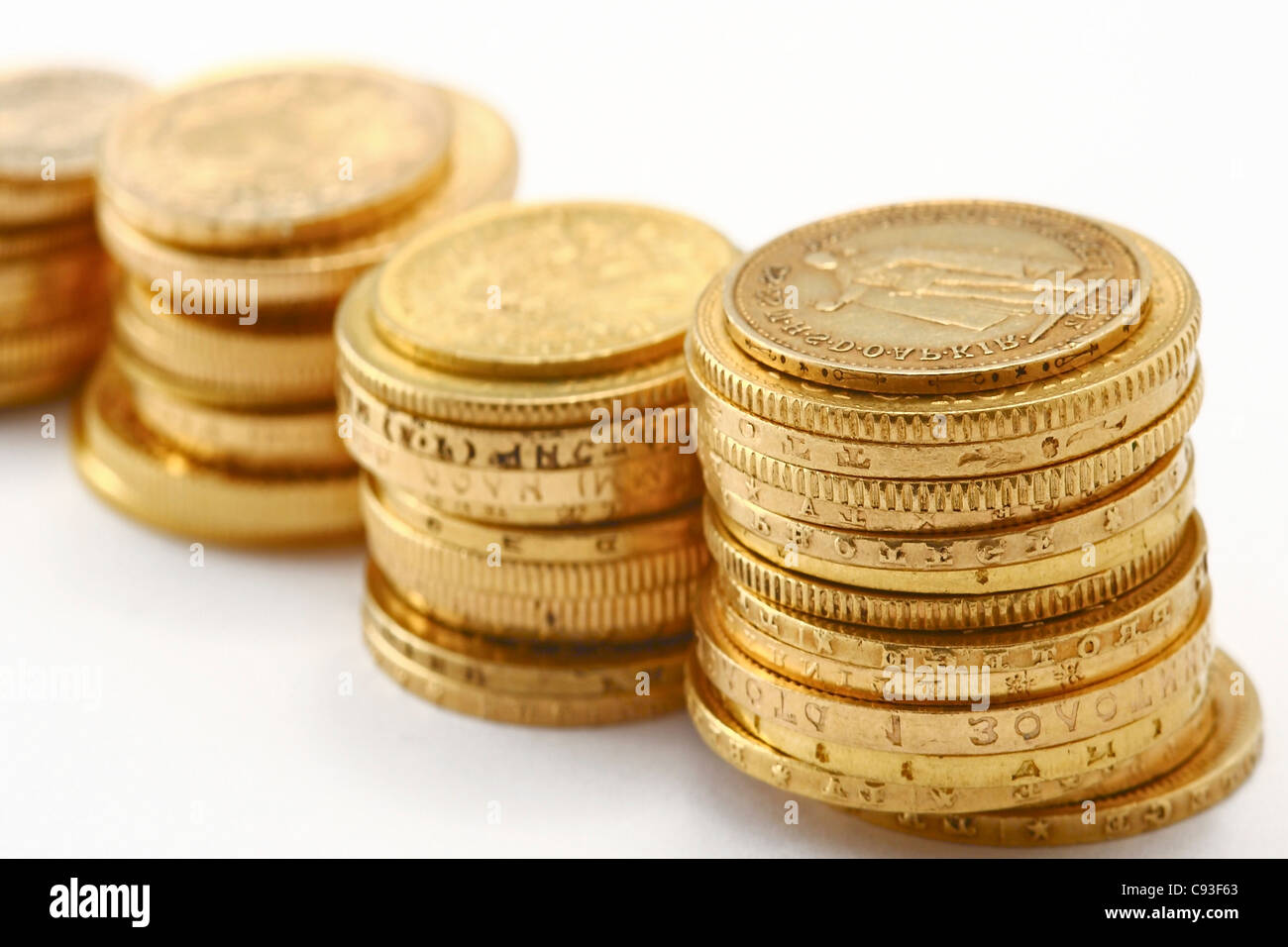 gold coins on the white background Stock Photo - Alamy