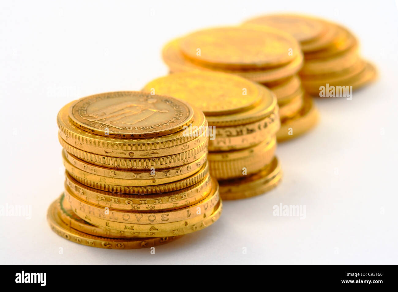 gold coins on the white background Stock Photo - Alamy
