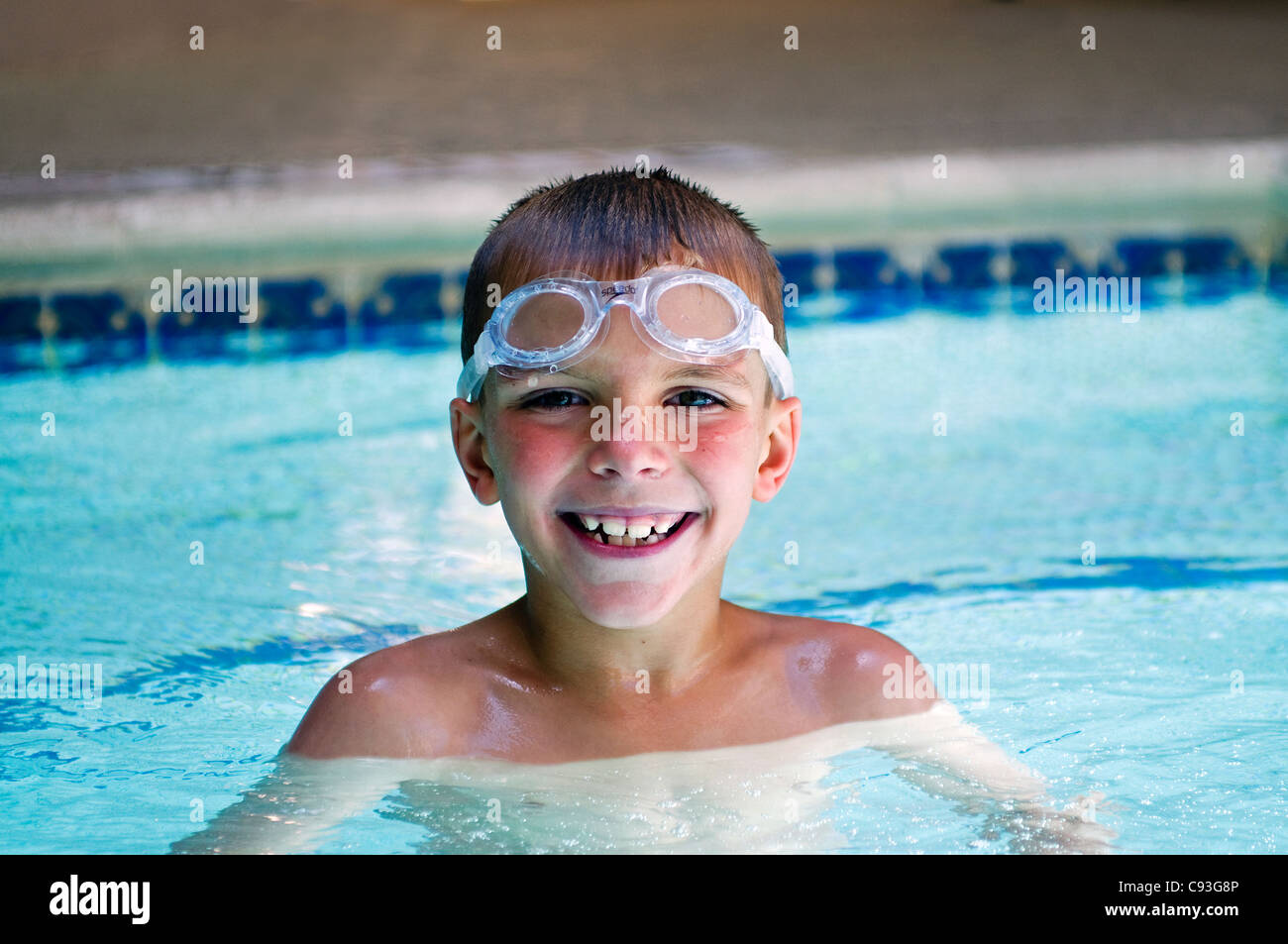 young boy swim swimming pool Stock Photo Alamy