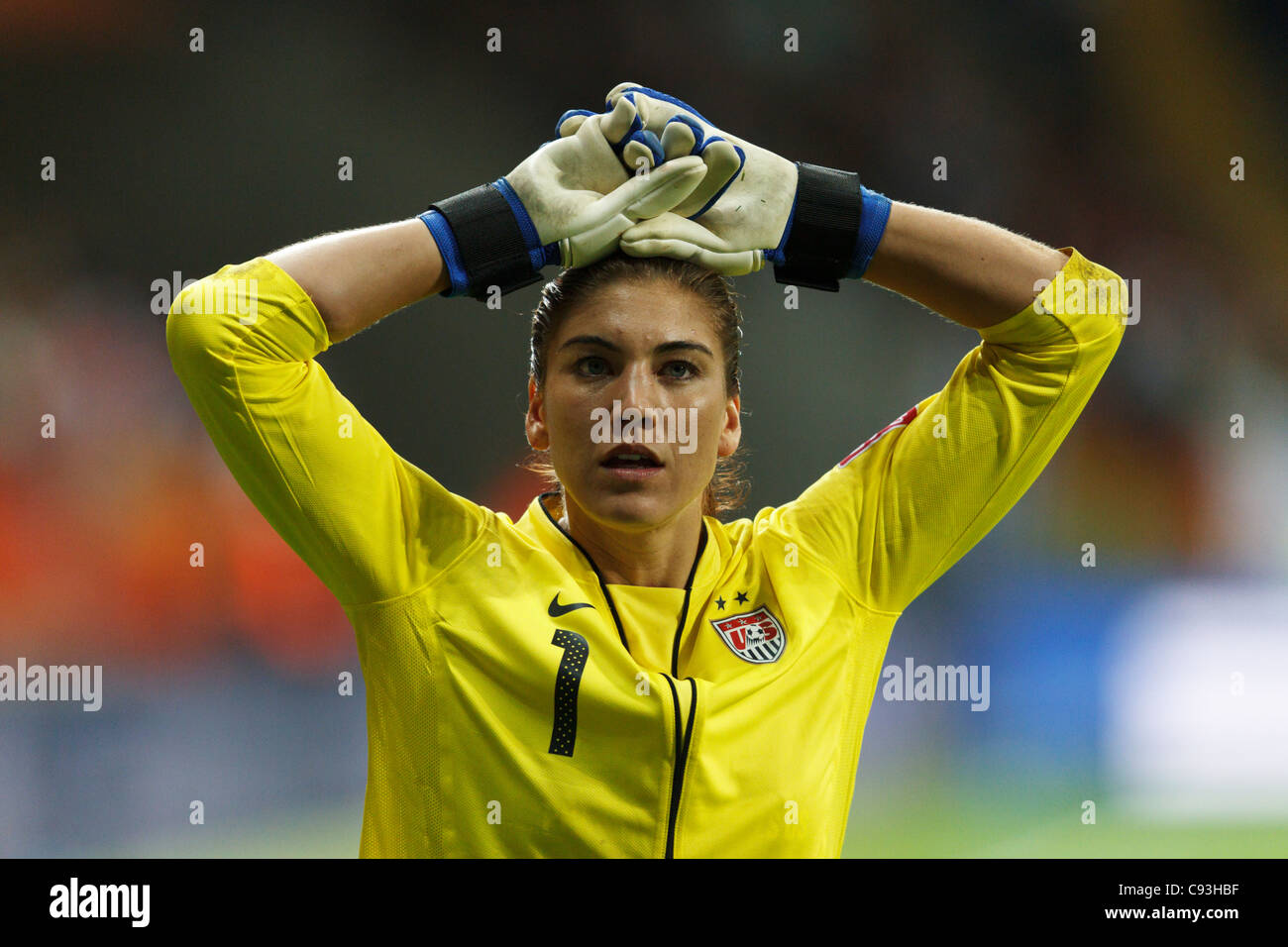Goalkeeper Hope Solo of the USA places her hands on her head during a tense PK shootout at the 2011 Womens World Cup final. Stock Photo