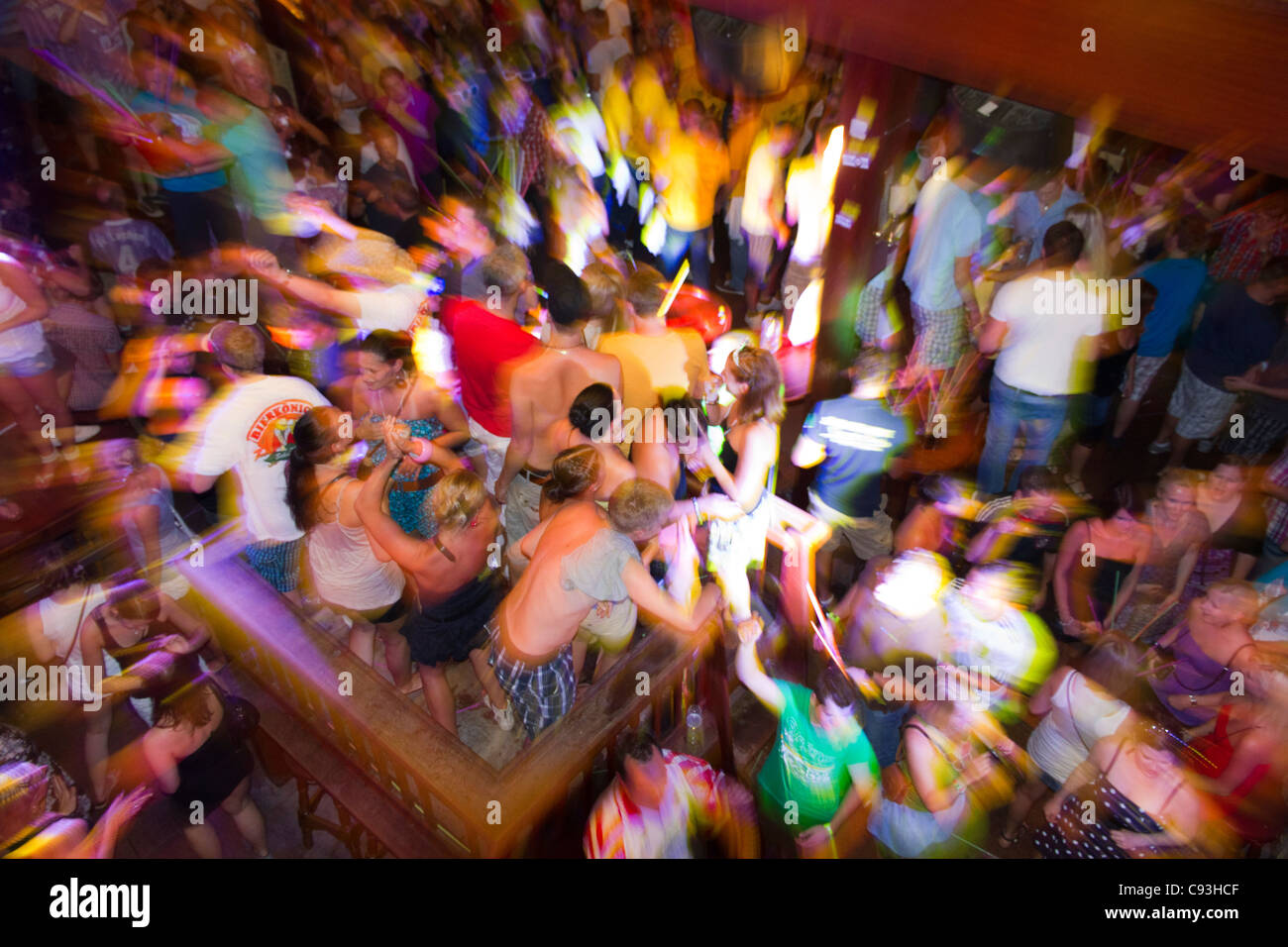 Crowd young people dancing at party in Disco Club El Arenal, Playa de Palma, Mallorca, Majorca Balearic Spain Stock Photo