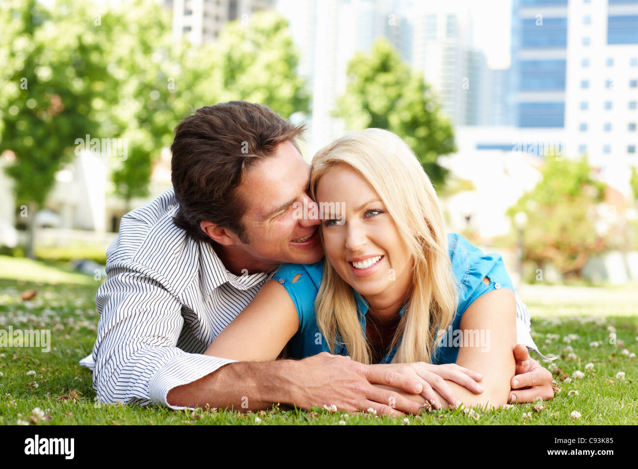 Couple in city park Stock Photo