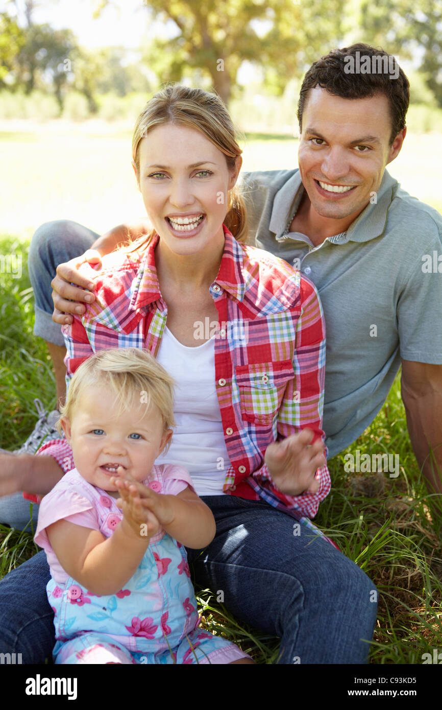 Parents and toddler outdoors Stock Photo