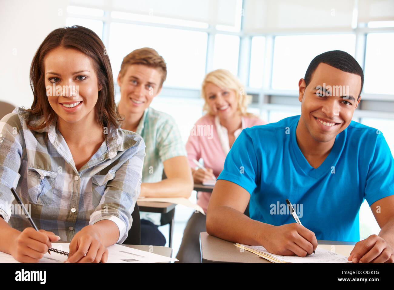 Students working in classroom Stock Photo
