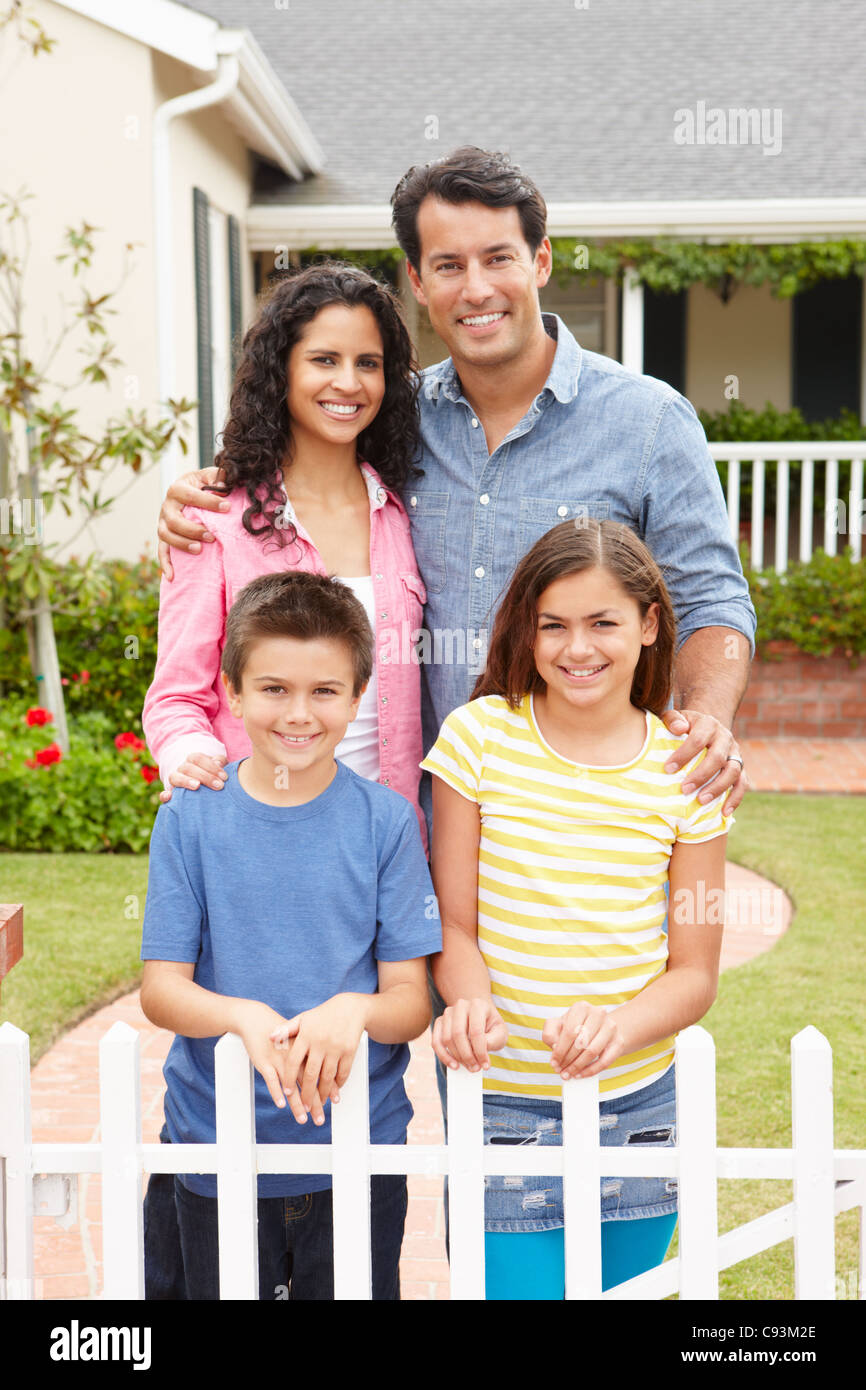 Hispanic family outside home Stock Photo - Alamy