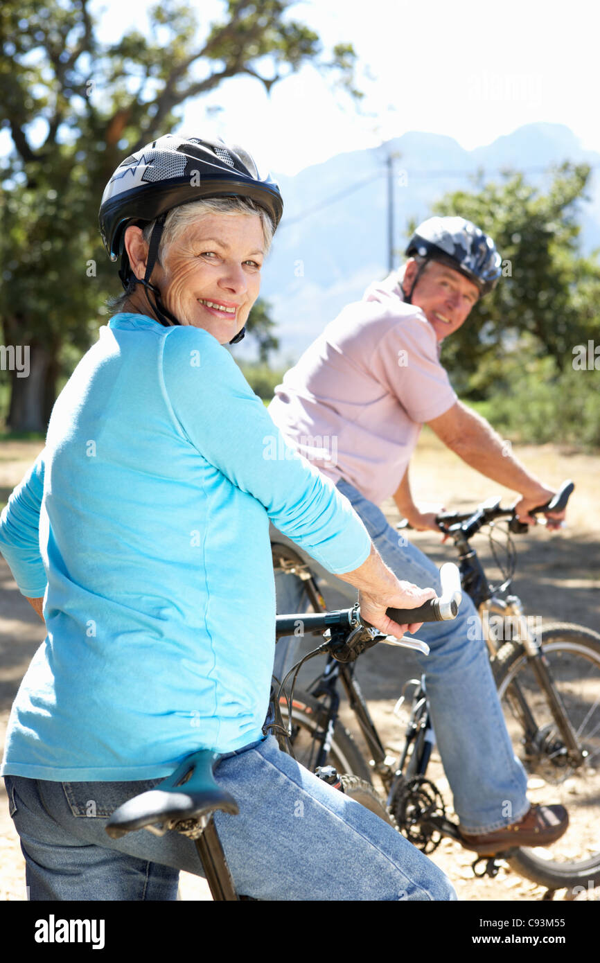Senior couple on country bike ride Stock Photo - Alamy