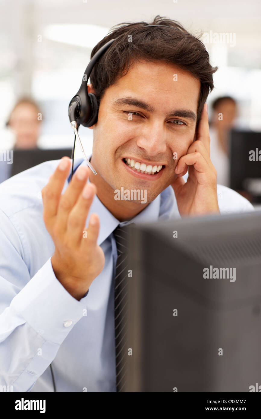 Businessman wearing headset Stock Photo