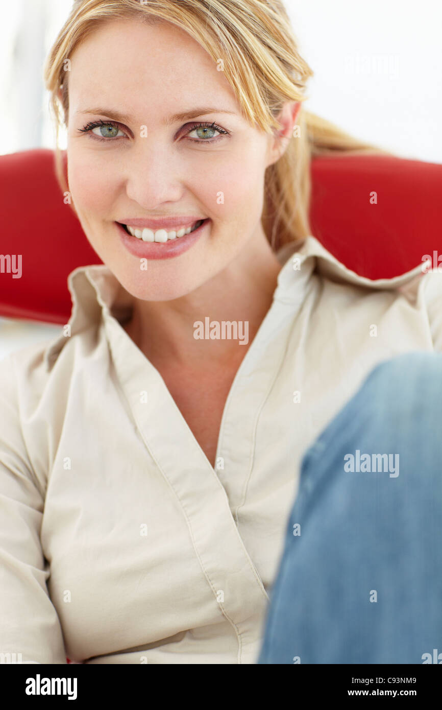 Woman red dress sitting hi-res stock photography and images - Alamy
