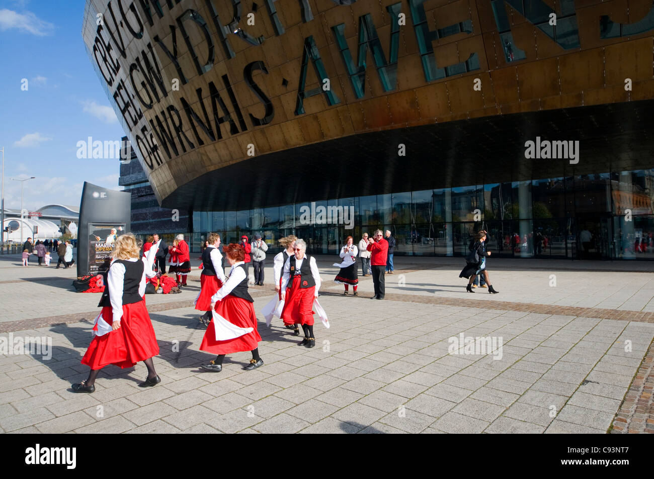 Morris dancing outside the Millennium centre in Cardiff, Wales. Stock Photo