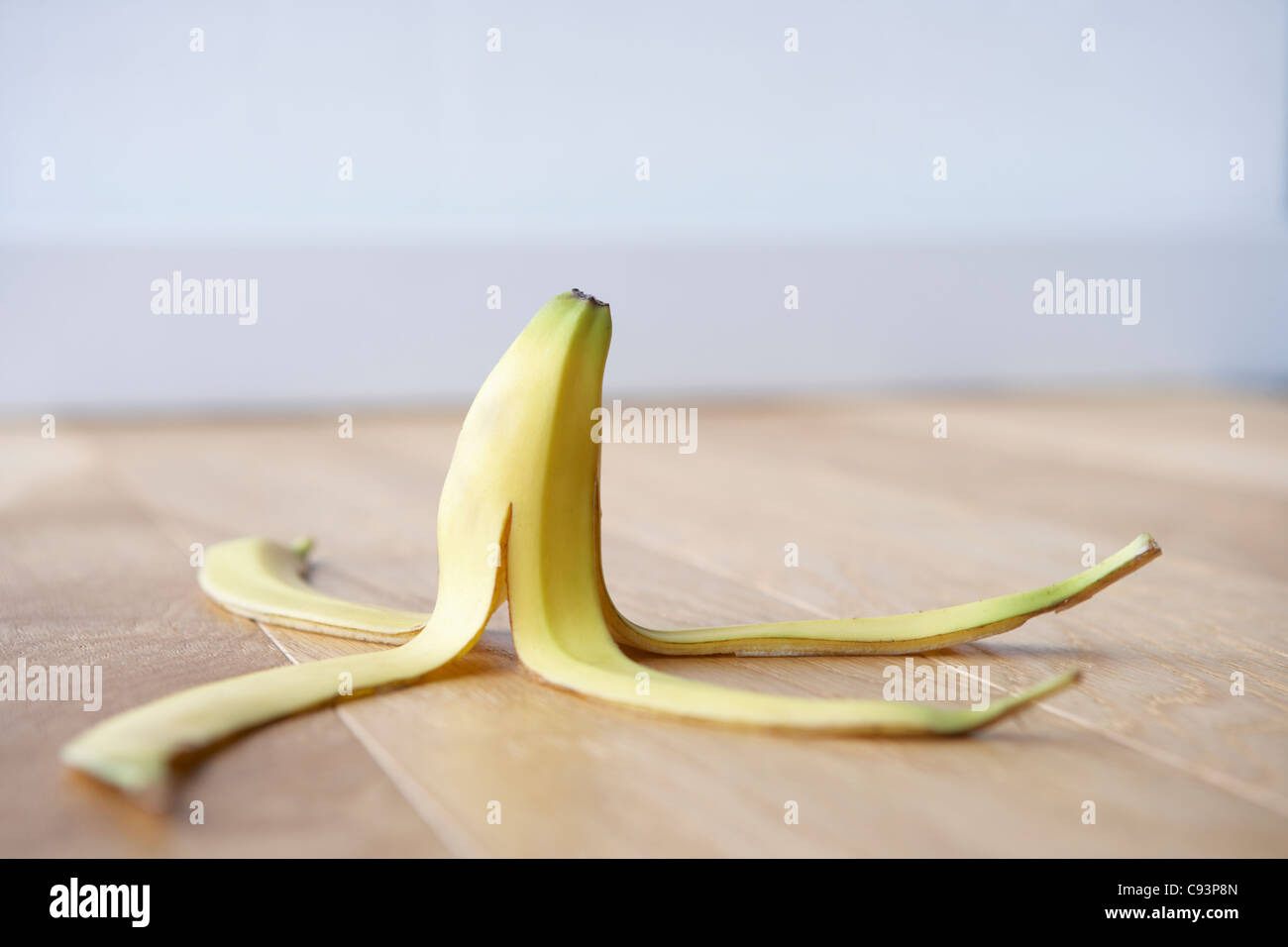 Banana skin on floor Stock Photo