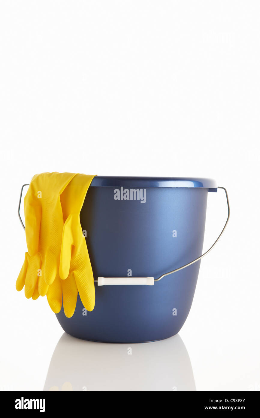 Bucket and rubber gloves Stock Photo