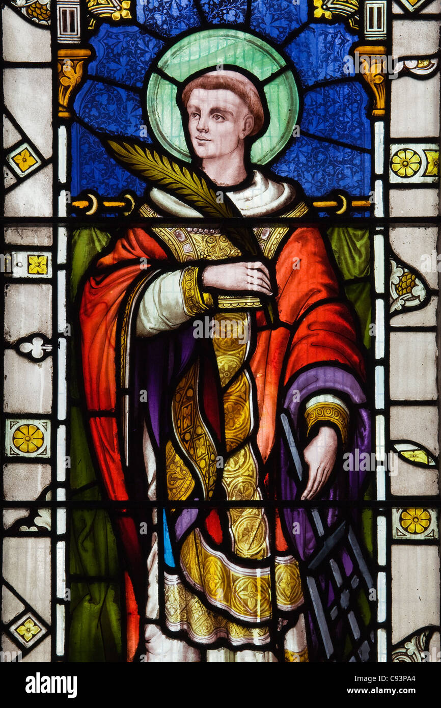 Stained glass window showing St. Lawrence in St. Lawrence's Church in Scunthorpe, North Lincolnshire Stock Photo