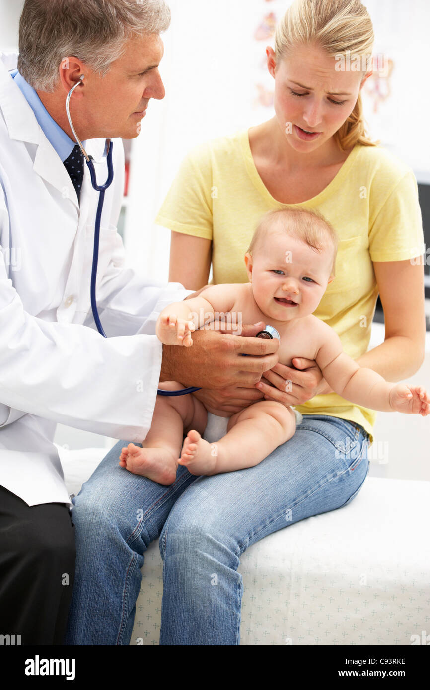 Pediatrician with baby Stock Photo