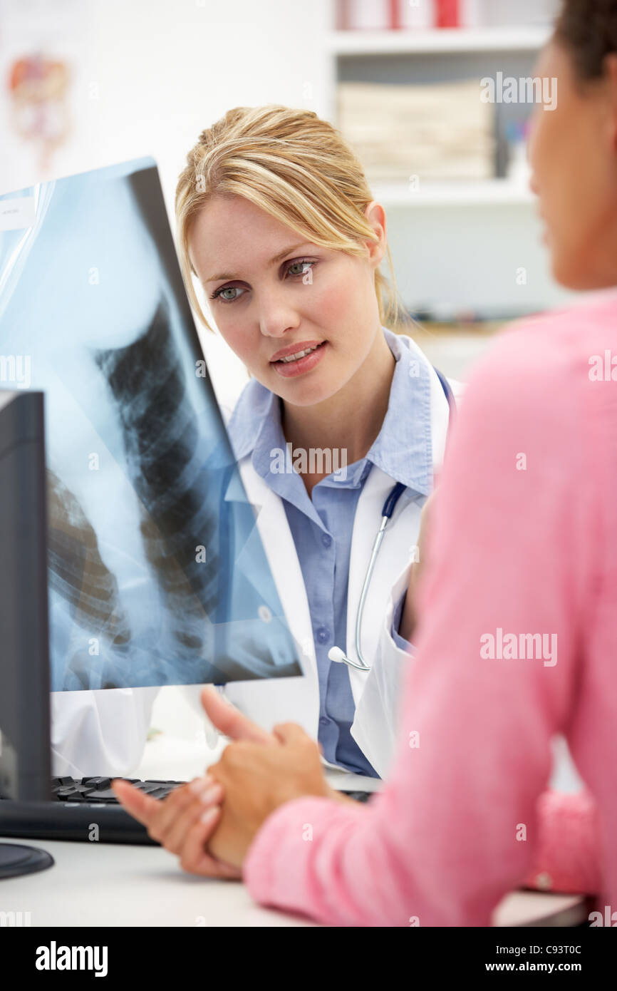 Young doctor with female patient Stock Photo