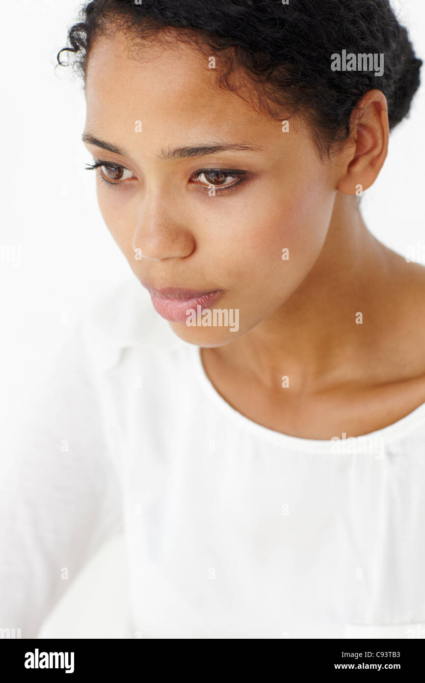 Attractive young woman thinking Stock Photo