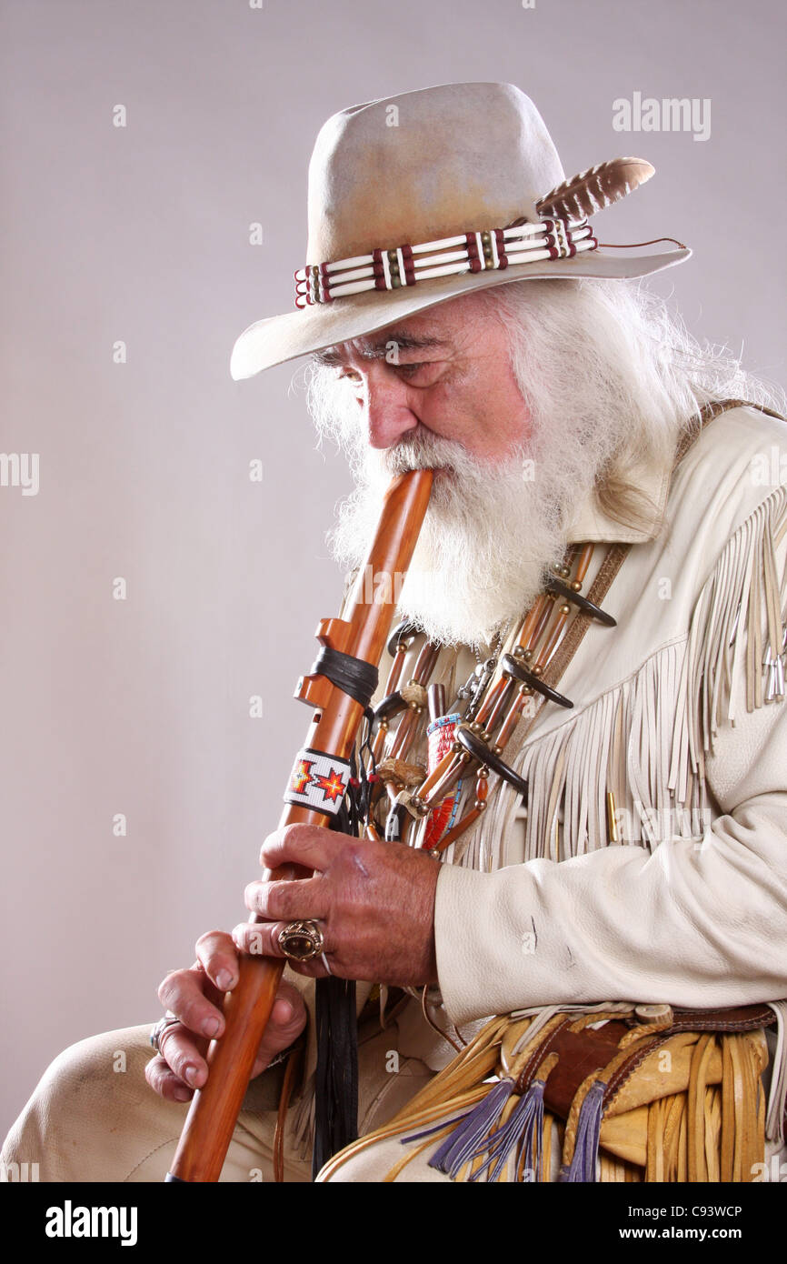 Indian man playing the flute hires stock photography and images Alamy