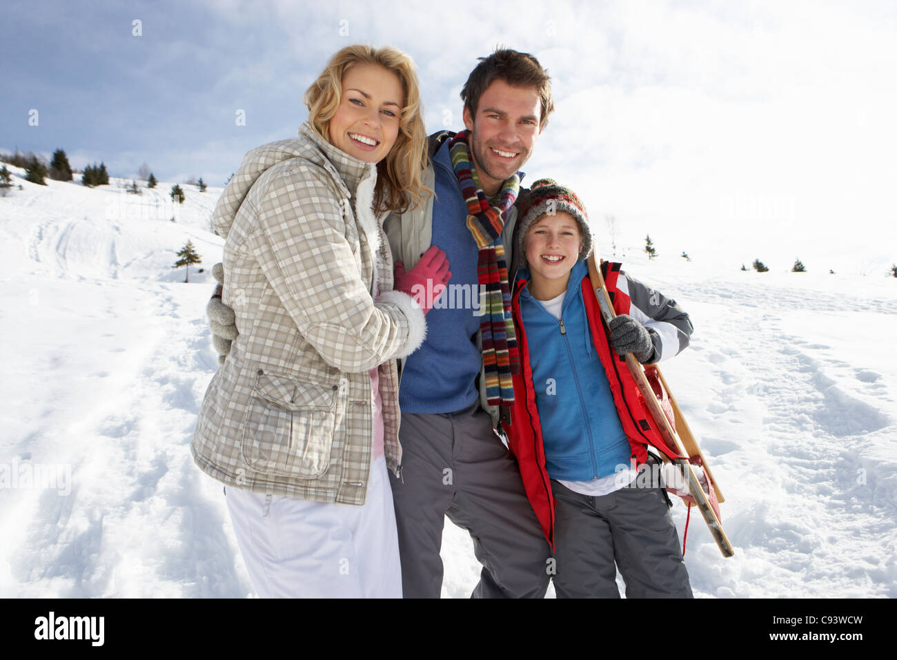 Young Family On Winter Vacation Stock Photo