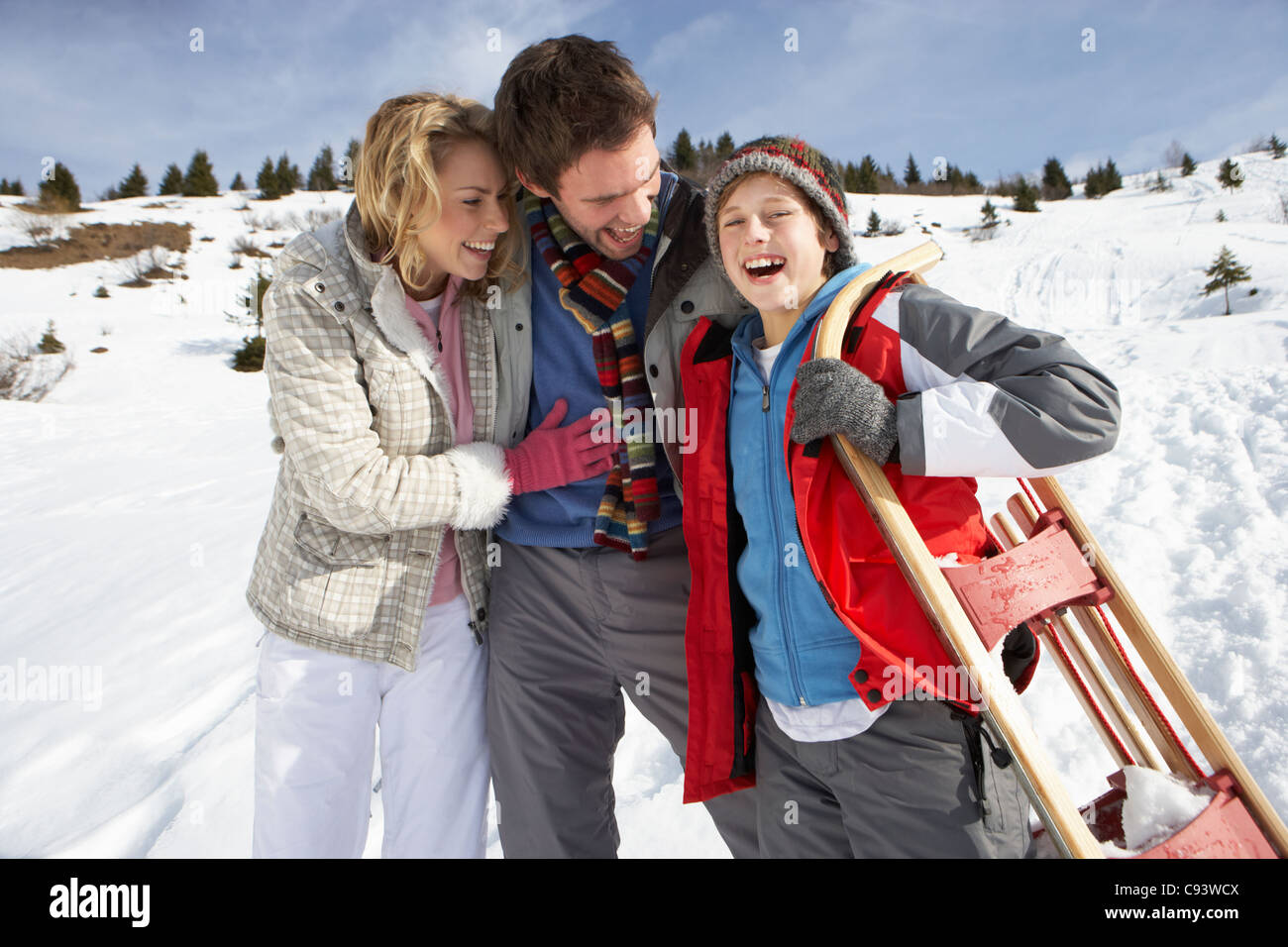 Young Family On Winter Vacation Stock Photo