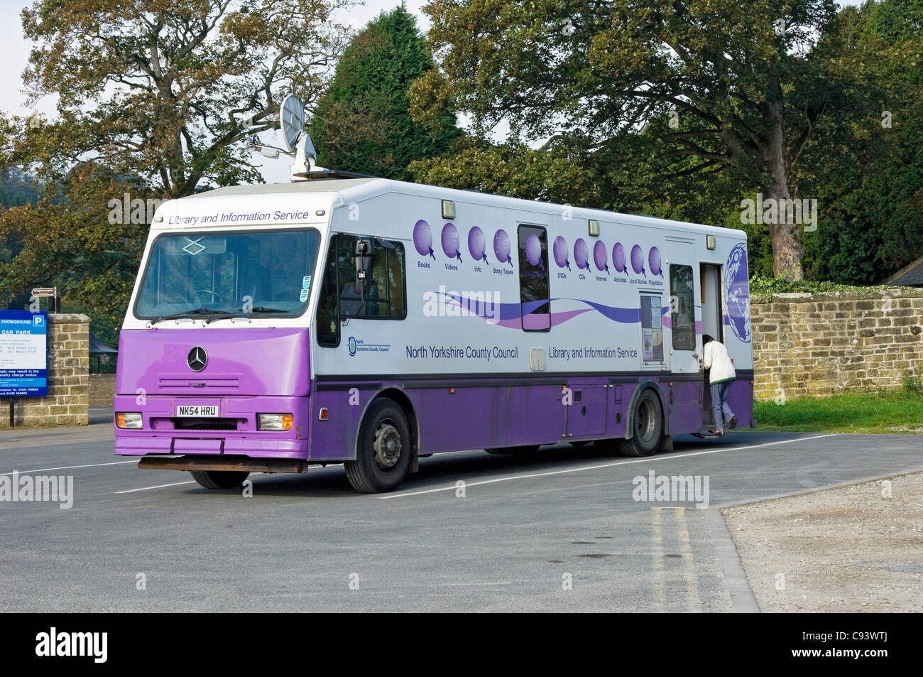 Mobile library service vehicle parked in Pateley Bridge village car park North Yorkshire England UK United Kingdom GB Great Britain Stock Photo