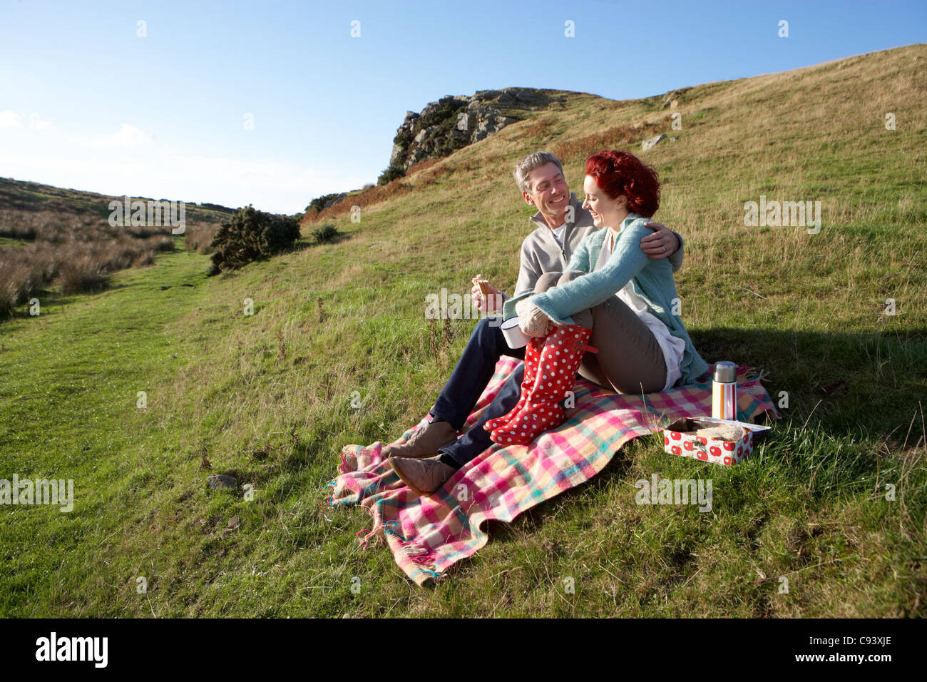 Couple on country picnic Stock Photo