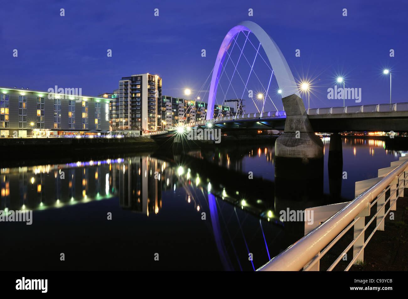Evening falls over the Clyde Arc (aka The Squinty Bridge) on Glasgow's River Clyde. Stock Photo