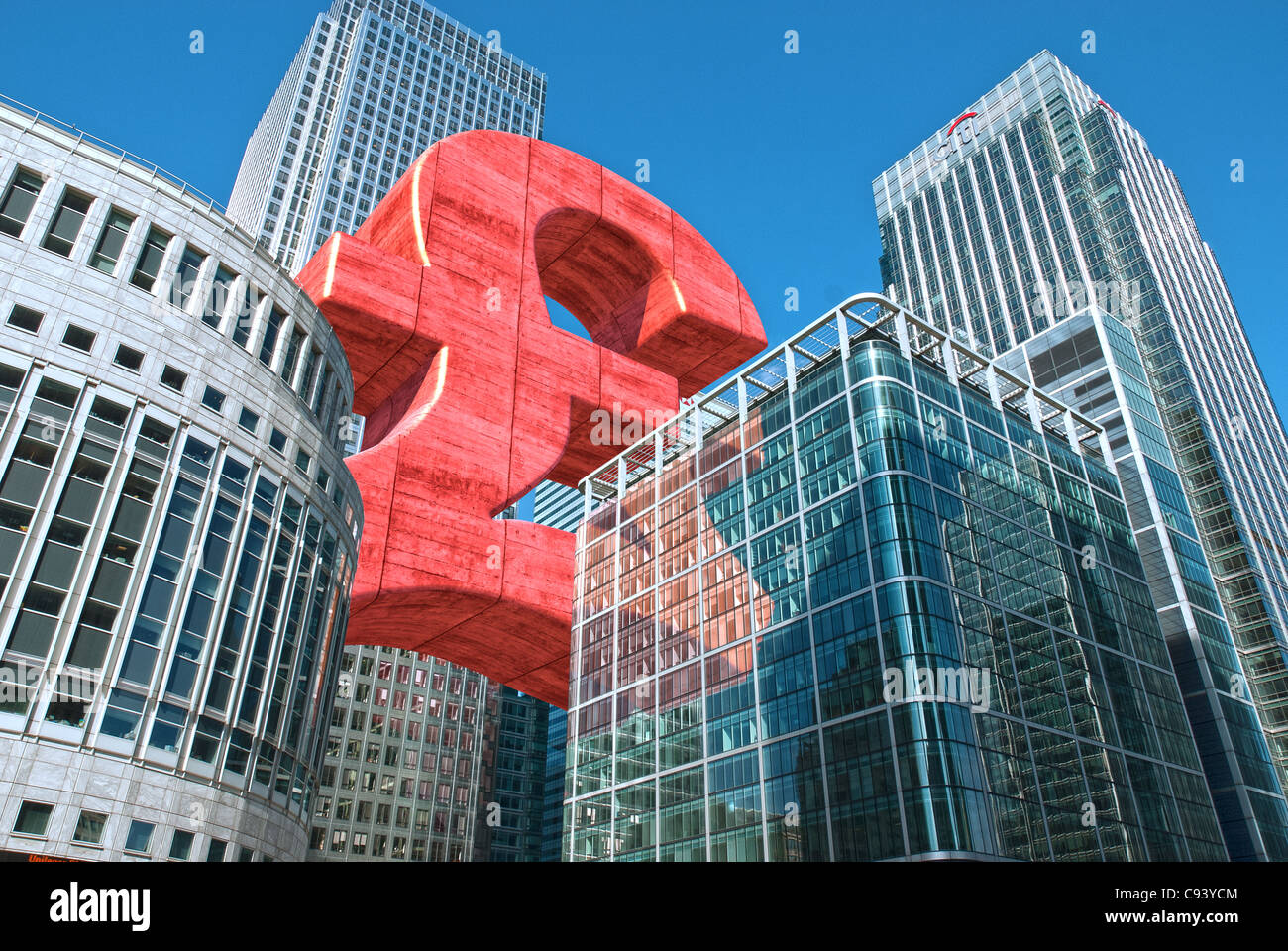 Digitally altered Photograph by hitandrun media. A Giant Pound Sterling symbol, floating between buildings in Canary Wharf, Lond Stock Photo