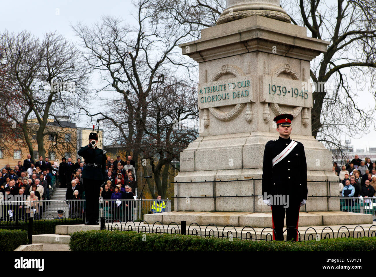 Bugler and guard of honour at the cenotaph during the Armistice Day (Remembrance Day) ceremony in Sunderland, Tyne and Wear, England. The ceremony honoured service people who have fallen in conflict. and was used to dedicate the City of Sunderland Memorial Wall. Stock Photo