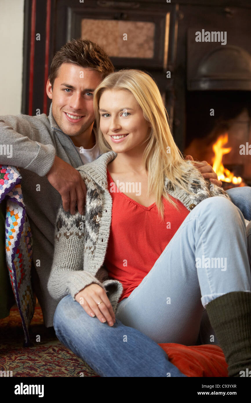 Young couple , by open fire Stock Photo