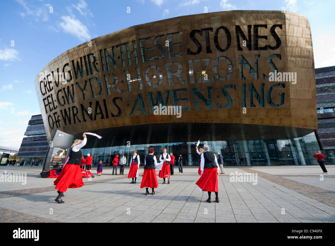 Morris dancers outside the Wales Millennium centre in Cardiff. Stock Photo